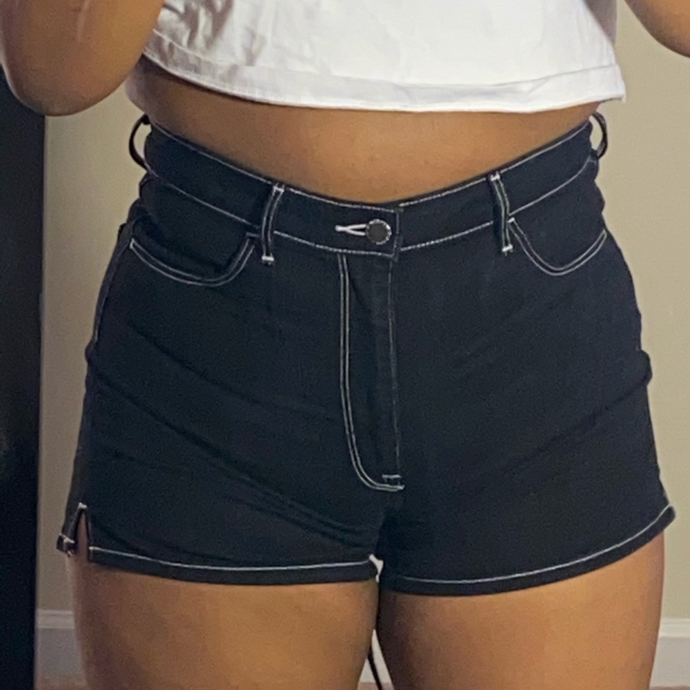 Black high waist denim shorts with white detailing
